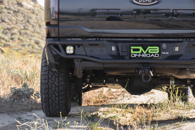 Ford F-150 Rear Bumper - DV8 Offroad - Tube design, Single exhaust models - Micro-texture black powder coat - `21-`26